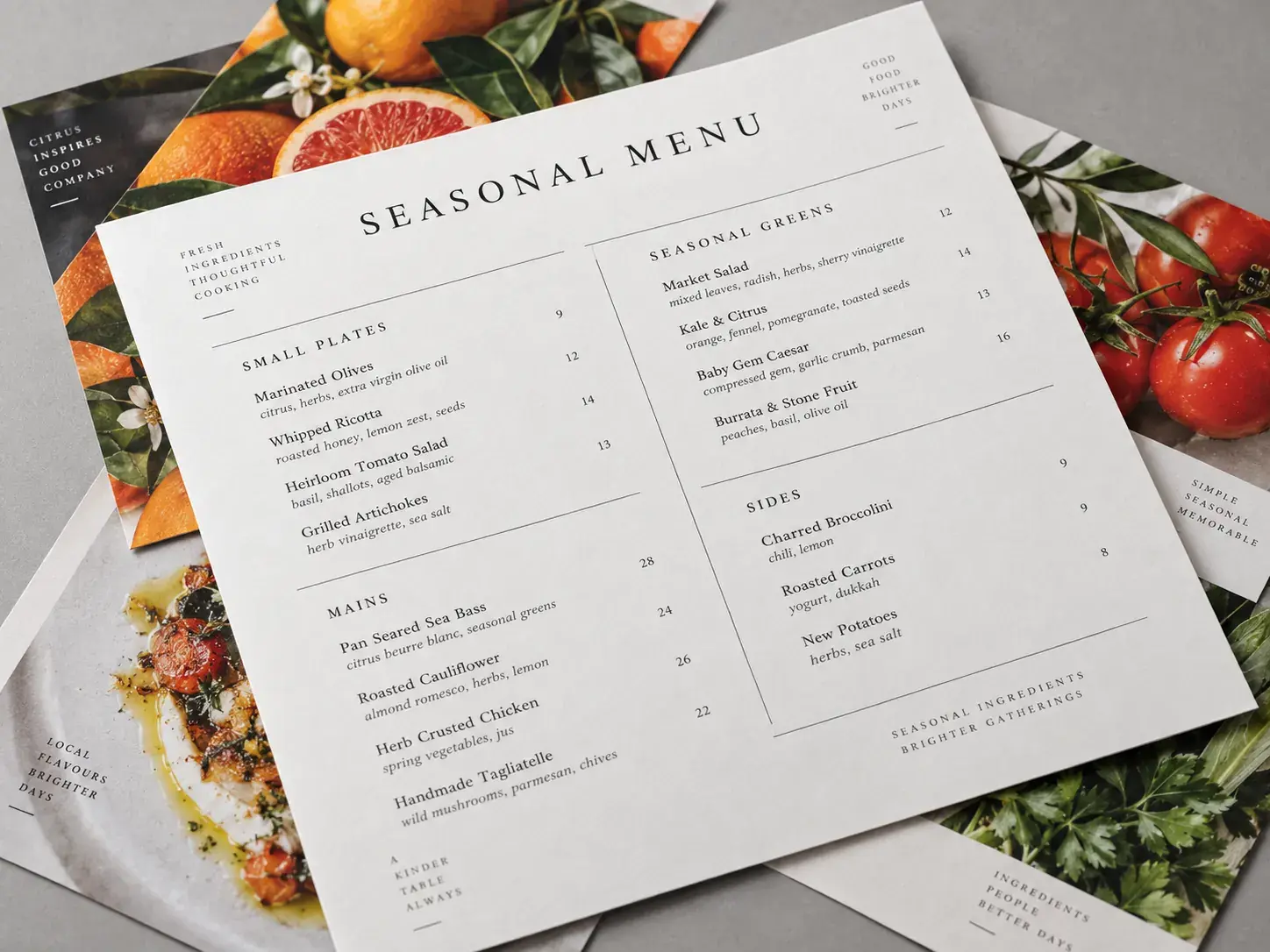 A flat landscape seasonal menu on top of other flat food flyers