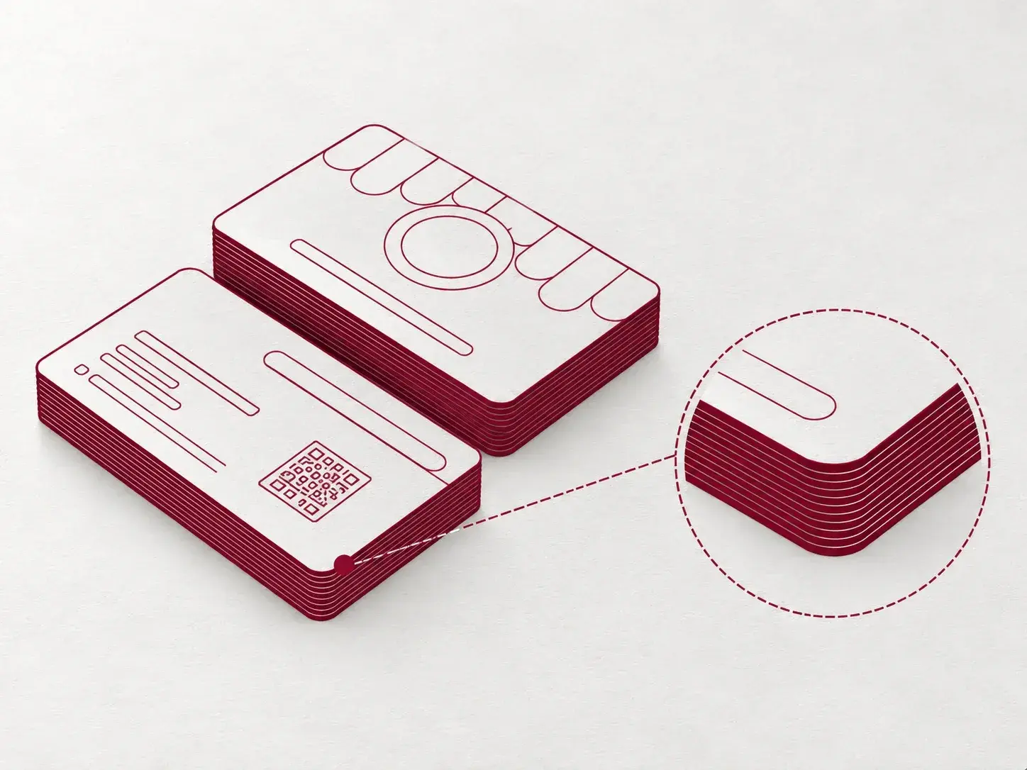 Line drawing of stacked cards with red painted edges and a magnified corner