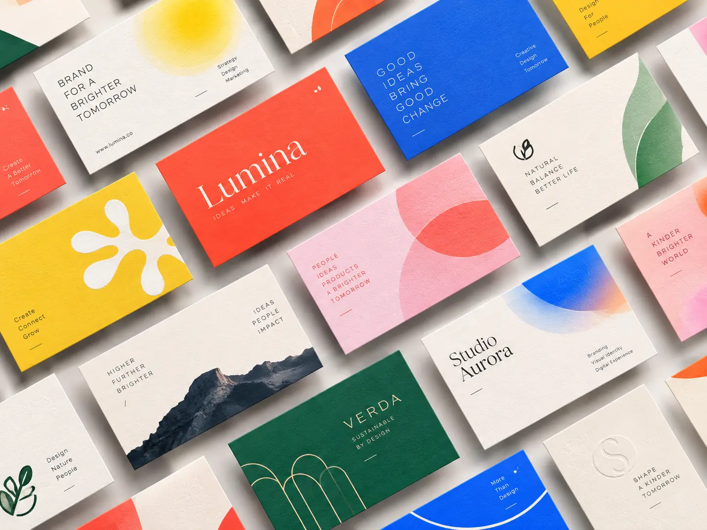 Rows of colorful printed business cards laid out at an angle